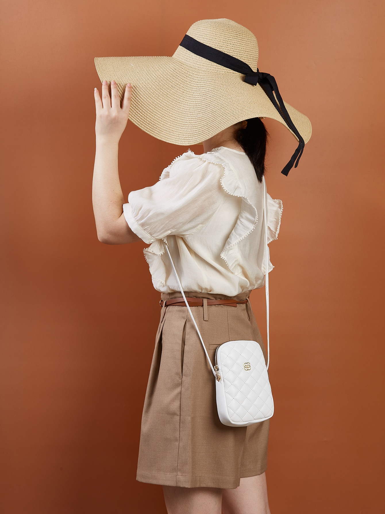 Minimalist quilted metal crossbody bag