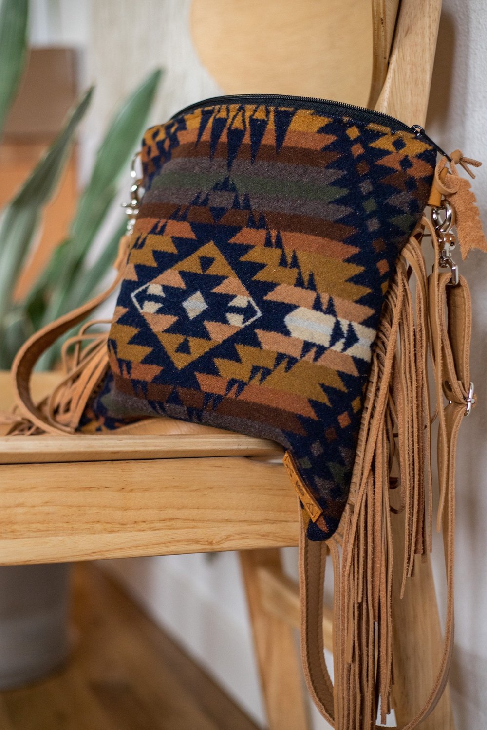 FRINGE CROSSBODY PURSE IN NAVY AND OLIVE WOOL