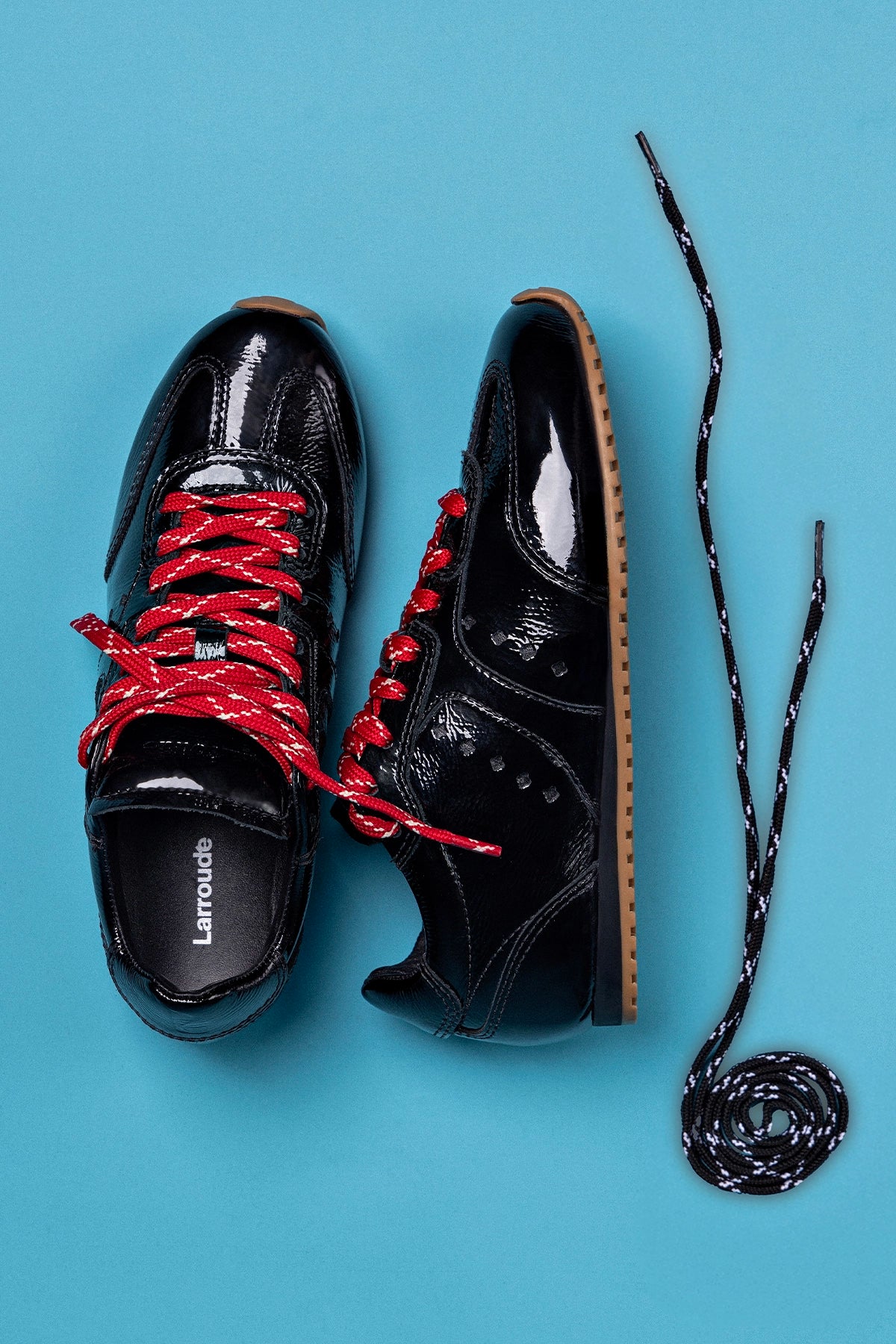 Stella Sneaker In Black Patent Leather