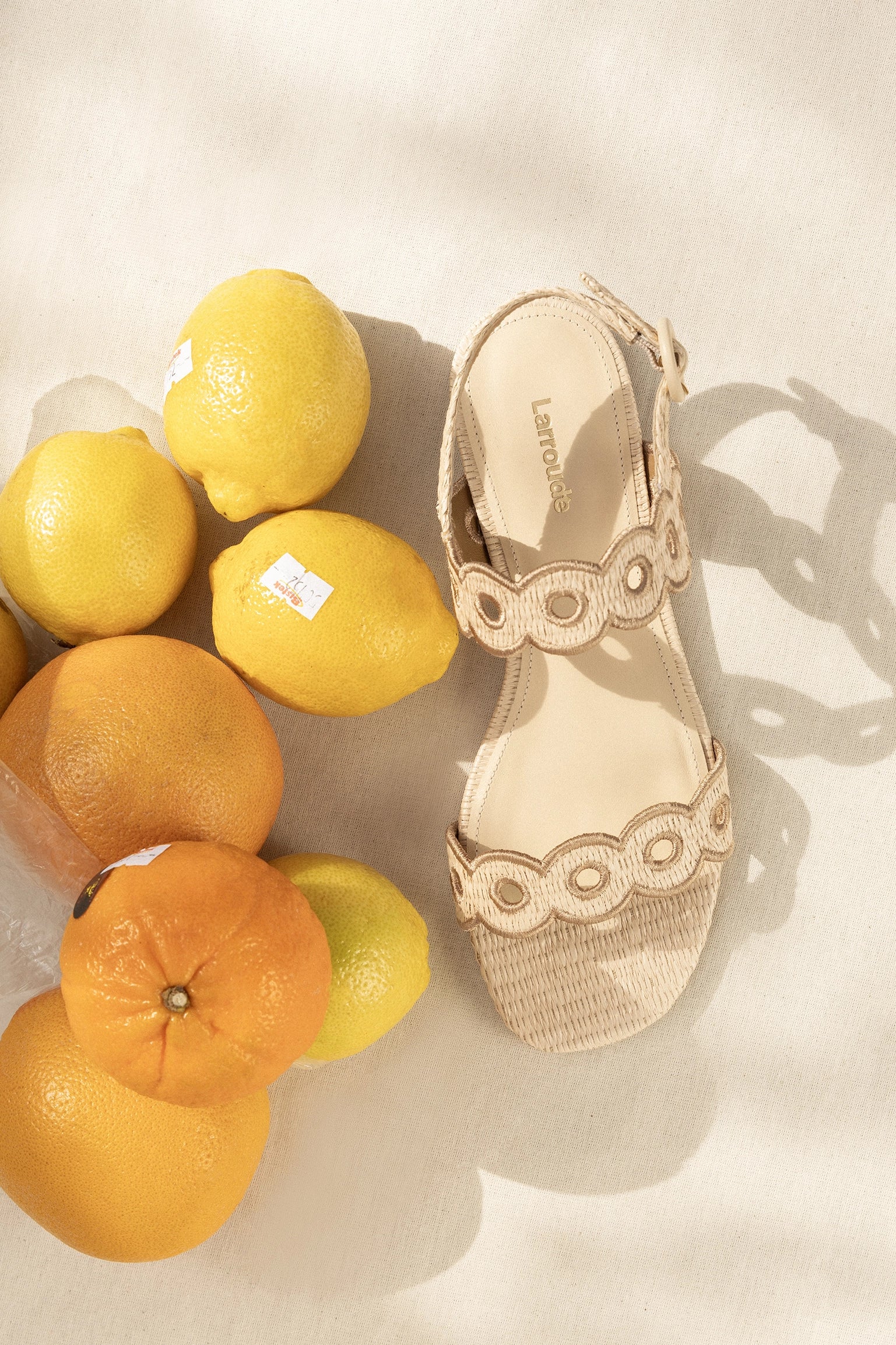 Florence Broderie Flat Sandal In Natural Raffia and Hazelnut Trimming