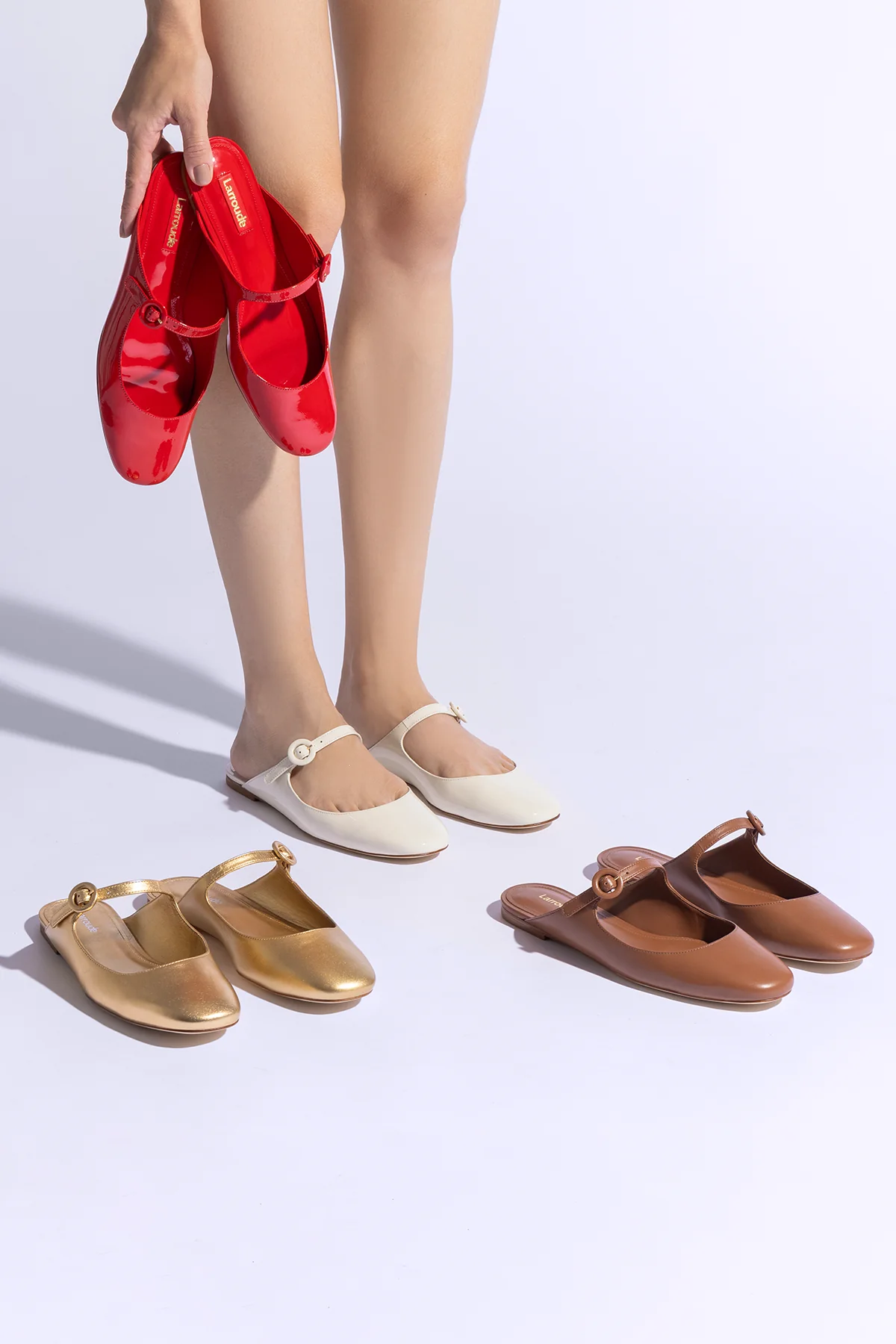 Blair Flat Mule In Gold Metallic Leather