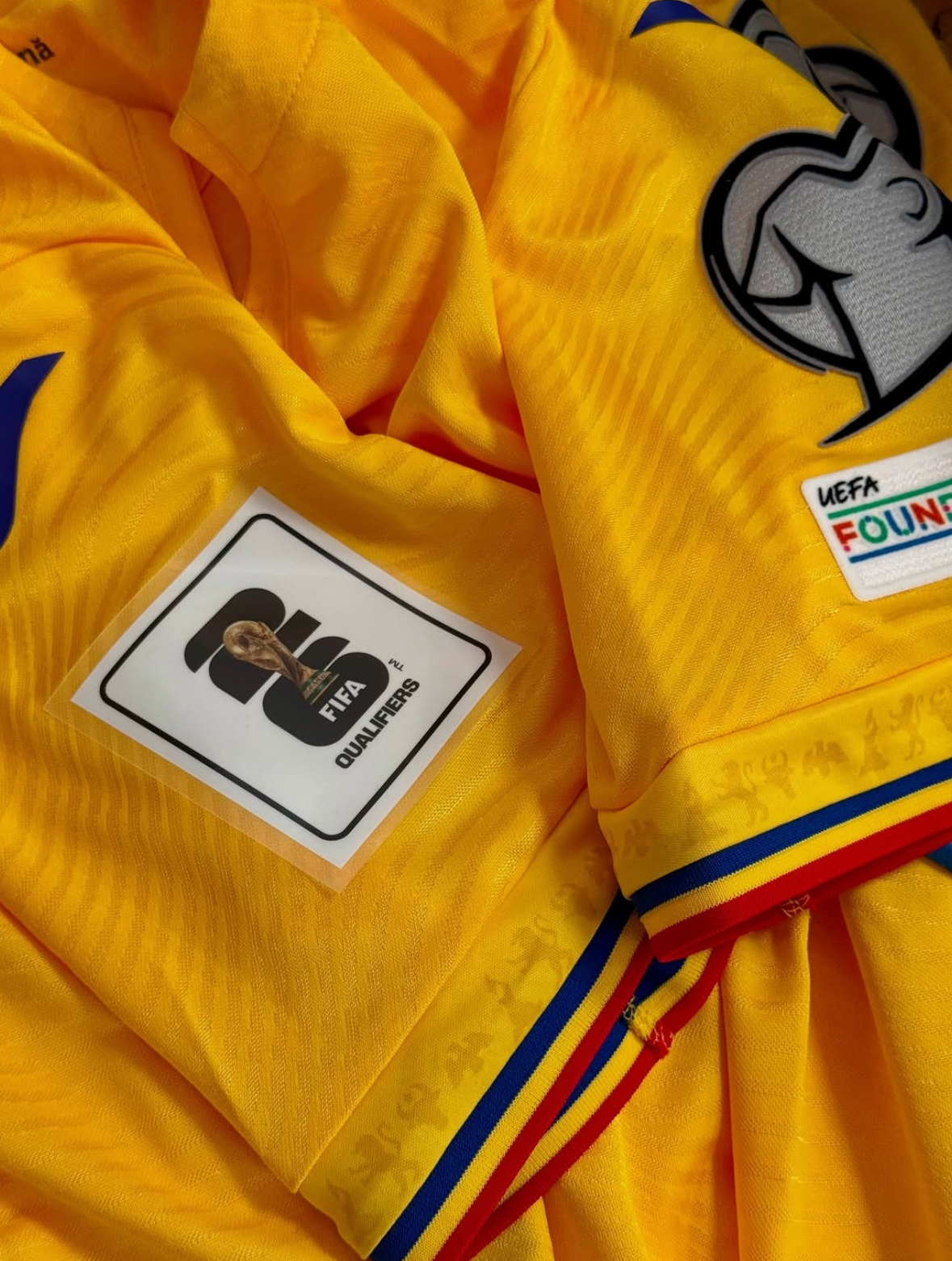 Romania's home football jersey for 2025-26 Fan version