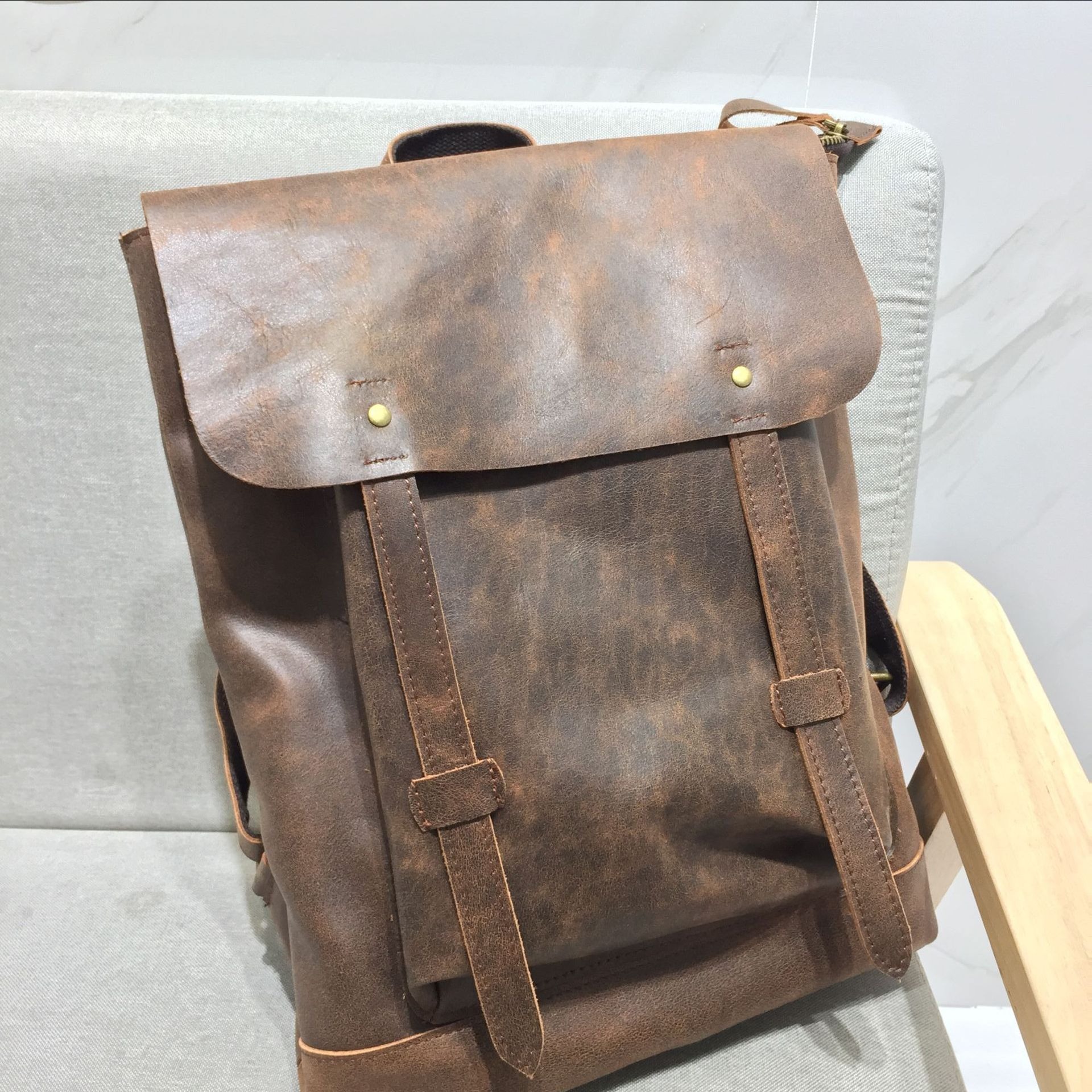 Brown Genuine Leather Backpack with Flap and Drawstring Closure