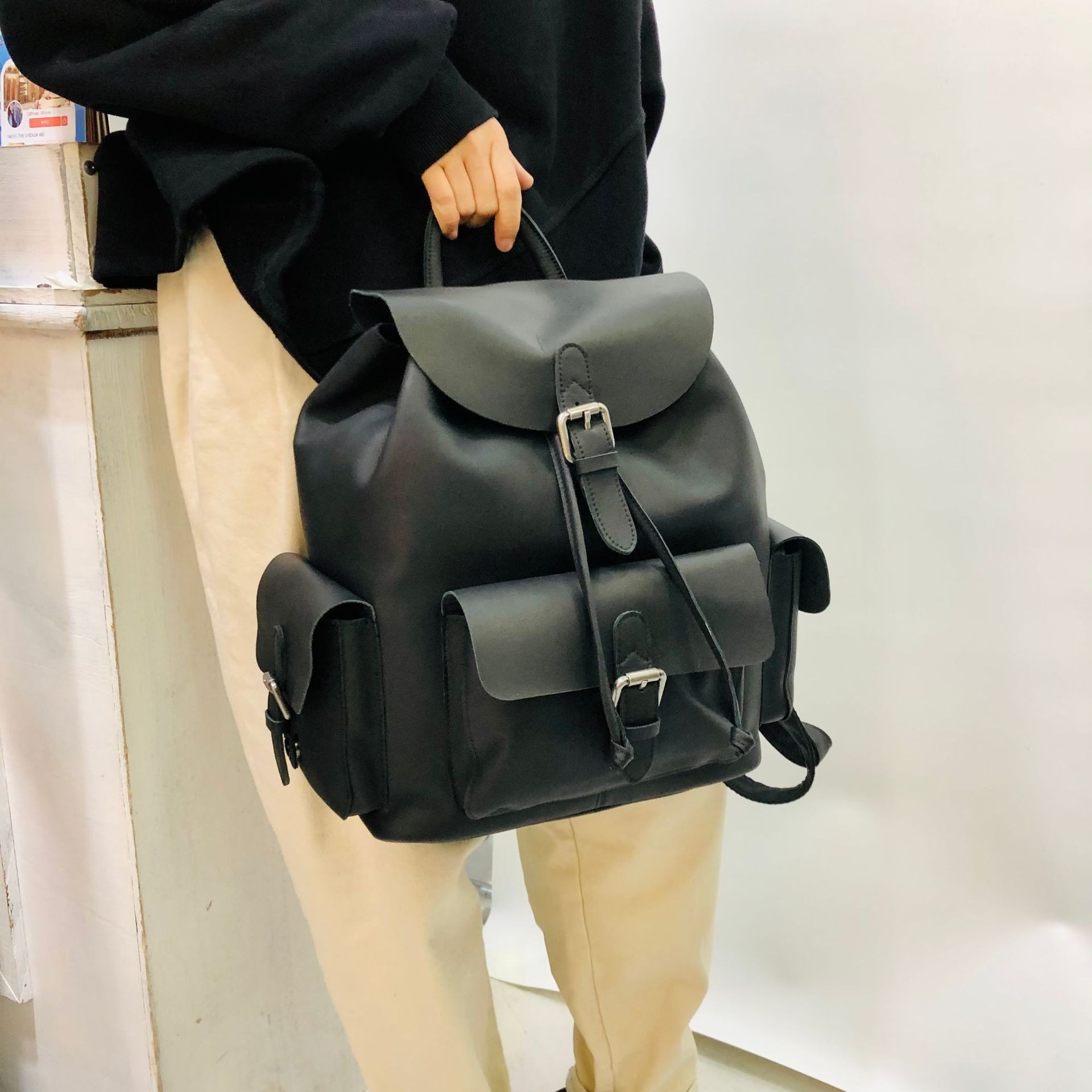 Genuine Leather Backpack with Flap and Drawstring Closure